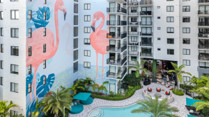 midrise-mural-luxury-apartment-building-facade-courtyard-pool-deck-coilor-dreamers